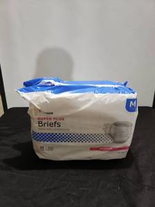 lot 8742 image: super plus briefs pkg ripped on end