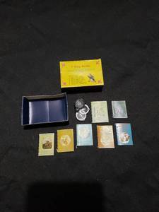 lot 8780 image: set 7 tiny books in box