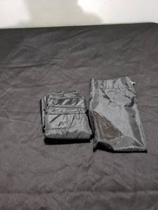 lot 8806 image: Black rain parka NIB