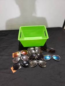 lot 8830 image: bucket of sunglasses