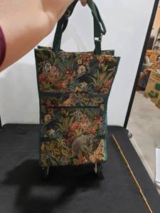 lot 8838 image: safari pattern rolling tote