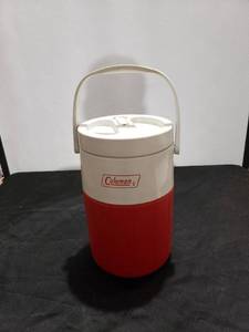 lot 8877 image: red Coleman thermos