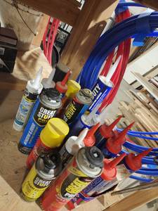 lot 29829 image: Assortment of Liquid Nail and Foam Sealant and Caulking Guns