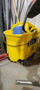 lot 29897 image: Yellow Rubbermaid Mop Bucket W a Mop