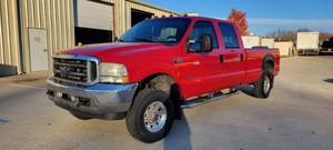 lot 5911 image: 2002 Ford F-250 XLT Super Duty Power Stroke Diesel V8 Crew Cab Pick-Up Truck, Red