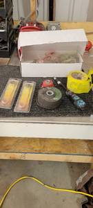 lot 10578 image: Chicago Electric Flint Strikers, Warrior 4 12in Grinding Wheels, Caution Tape, and More
