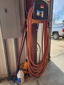 lot 10700 image: Mesure Meter, Heavy Duty Hose and Brooms