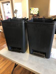 lot 4596 image: Two black trash cans missing lids