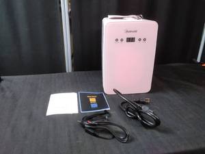 lot 4886 image: AstroAI mini fridge 6 liter dorm bedroom makeup portable cooler with car auto jack No box