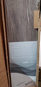 lot 3536 image: Water Resistant Laminate Flooring 50.63x7.56x.47 Inches (brandcolor name unknown)