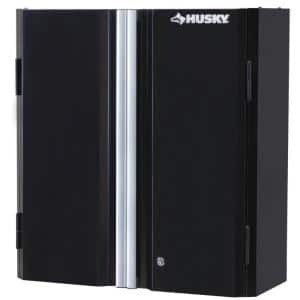 lot 12971 image: Husky Ready-to-Assemble 24-Gauge Steel Wall Mounted Garage Cabinet in Black (28 in. W x 29 in. H x 12 in. D) - Retail $149.99