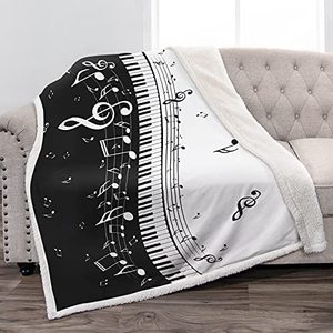 lot 12870 image: White Wool Blanket With Piano And Key Note Design, 5 x 45