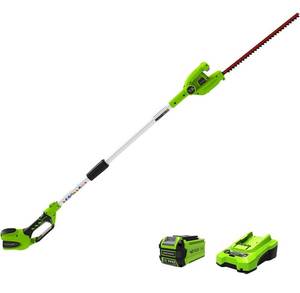 lot 39750 image: $$ Greenworks 40V 20 Cordless Pole Hedge Trimmer, 2.0Ah Battery and Charger Included, Retail $199