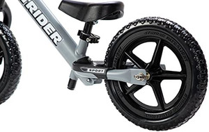 lot 5606 image: Strider - 12 Sport Kids Balance Bike, No Pedal Training Bicycle, Lightweight Frame, Flat-Free Tires, For Toddlers and Children Ages 18 Months to 5 Years Old