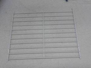 lot 63115 image: Frigidaire Wire Flip Out Shelf