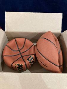lot 38763 image: 2 BASKETBALLS 1 AMAZON BALL 1 WILSON BALL