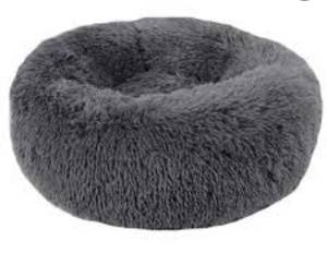 lot 10480 image: Calming Cuddler Long Fur Donut Dog Bed -