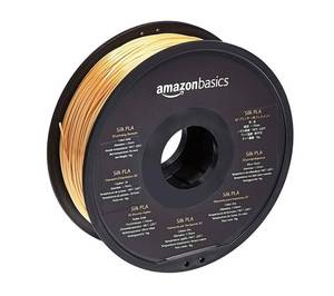 lot 59962 image: Amazon Basics SILK PLA 3D Printer Filament, 1.75mm, Gold, 1 kg Spool (2.2 lbs)