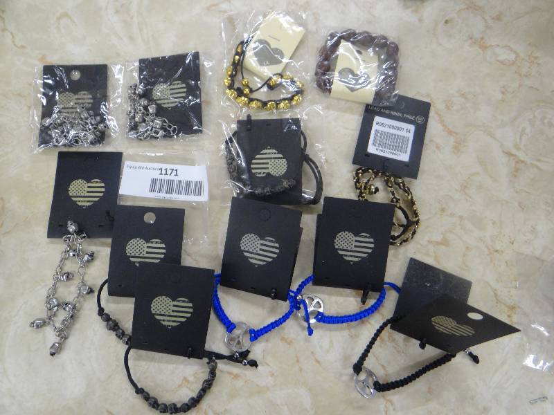 lot 1171 image: Lot of skull, peace sign, & beaded bracelets - 12Pcs.