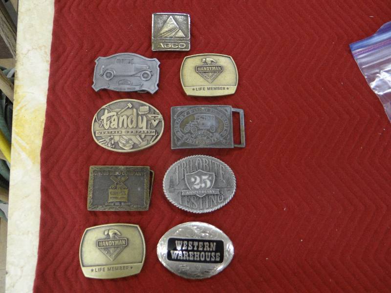 lot 1177 image: Lot of 9 advertising belt buckles.