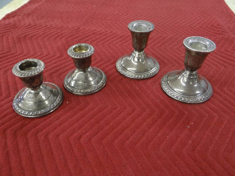 lot 1181 image: 2 Sets of sterling silver candle stick holders.