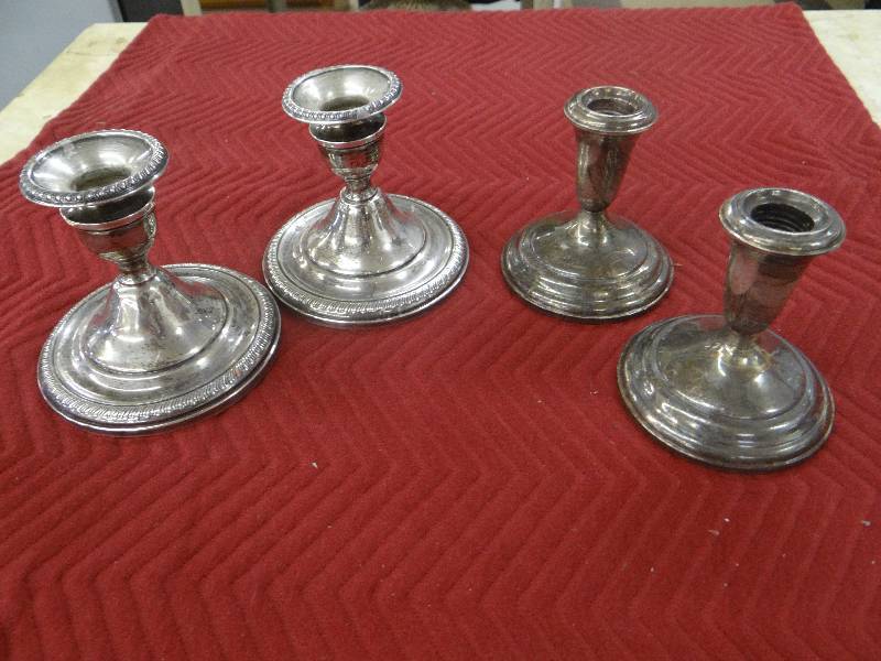 lot 1182 image: 2 Sets of sterling silver candle stick holders.