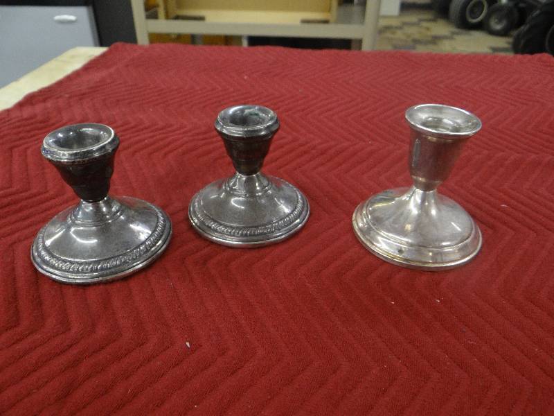 lot 1183 image: 1 Pair & 1 single sterling silver candle stick holders.