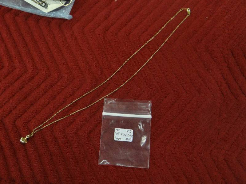 lot 1124 image: 14K shell pendent wpearl & link chain.