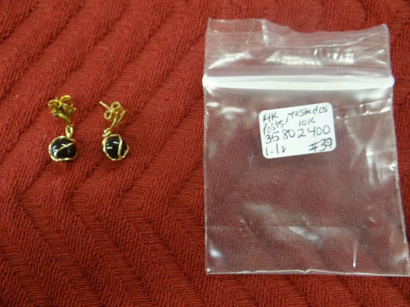 lot 1125 image: 10K gold post earrings wblack stones.