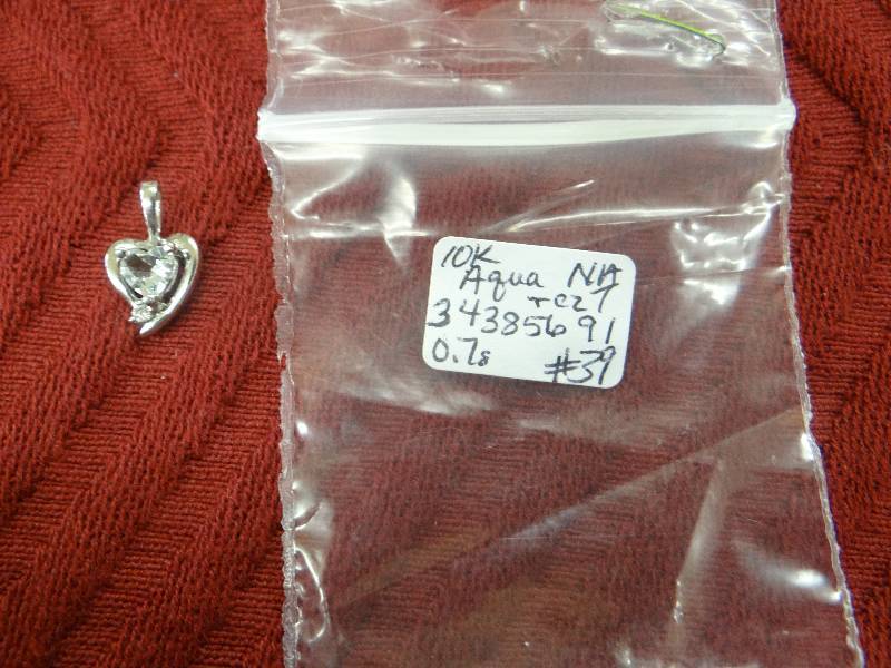 lot 1130 image: 10K white gold heart pendent eaquamarine & CZ.