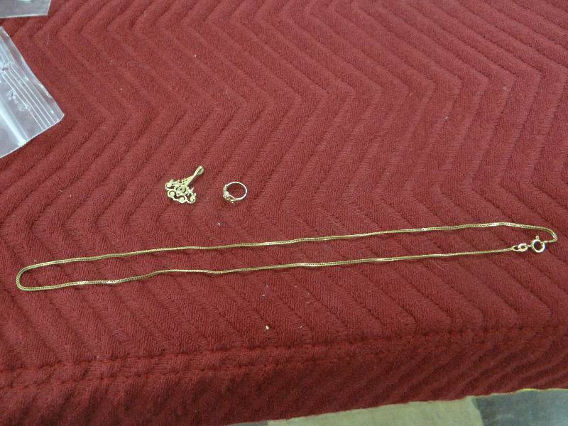 lot 1135 image: 14K gold 18 necklace, mom pendent, & tri-gold baby ring.