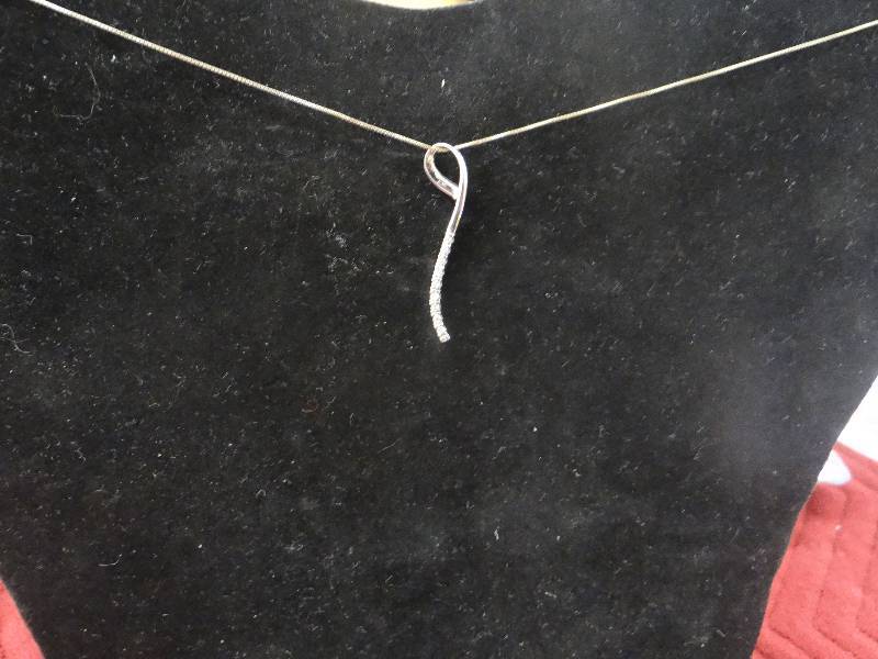lot 1138 image: 10K white gold necklace & pendent wdiamond accents. 19 chain.