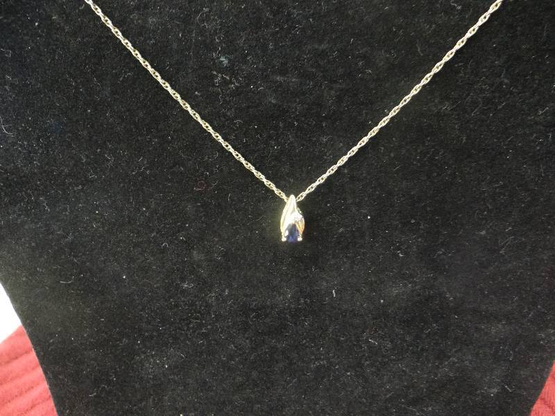 lot 1140 image: 14K gold max chain necklace wdiamond & topaz pendent. 18 chain.