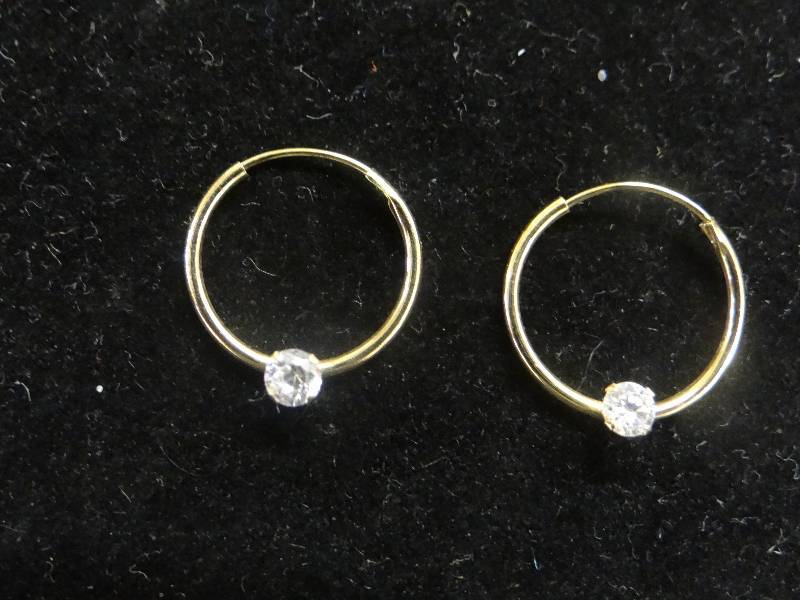 lot 1150 image: 14K gold small hoop wCZ earrings.
