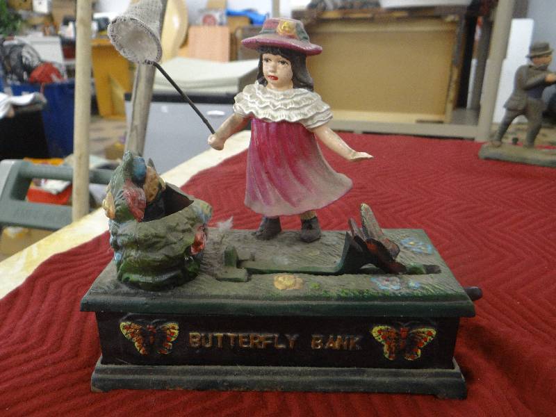 lot 1186 image: Vintage painted iron Butterfly bank bank - spring action.