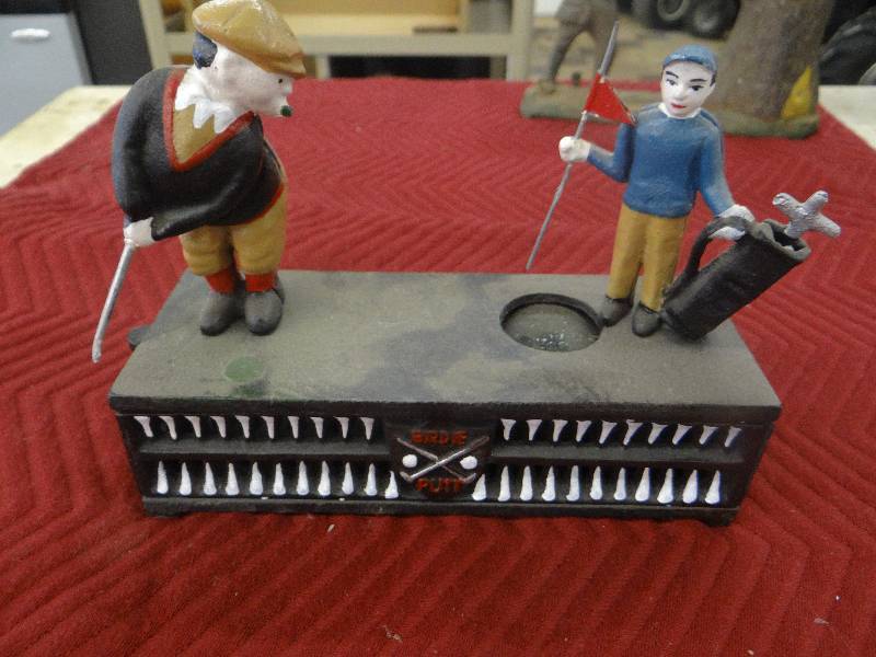lot 1187 image: Vintage painted iron Birdie putt bank - spring action.