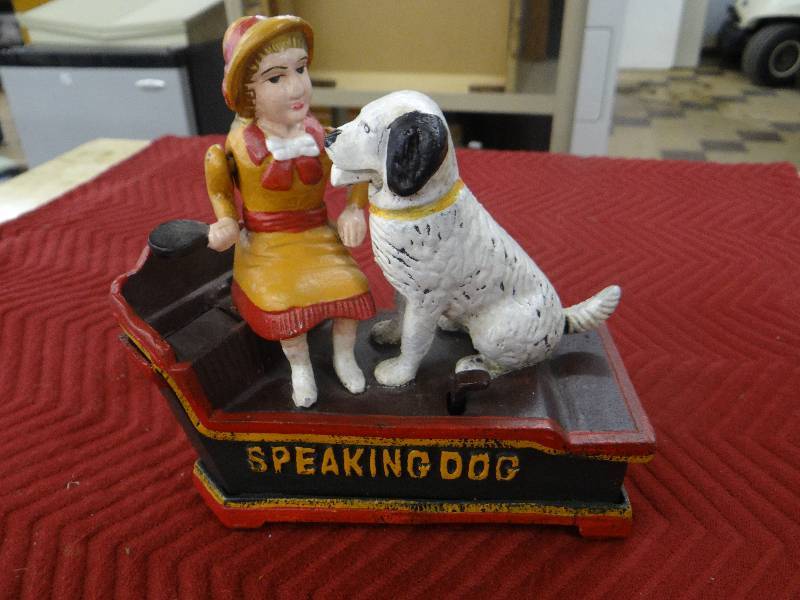 lot 1190 image: Vintage painted iron Speaking dog bank - spring action.