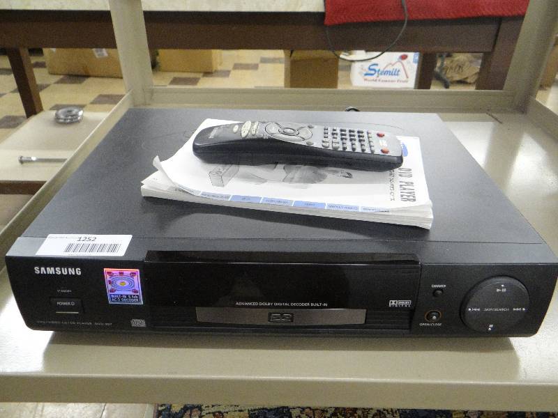 lot 1252 image: Samsung DVD player wremote & Manuel.
