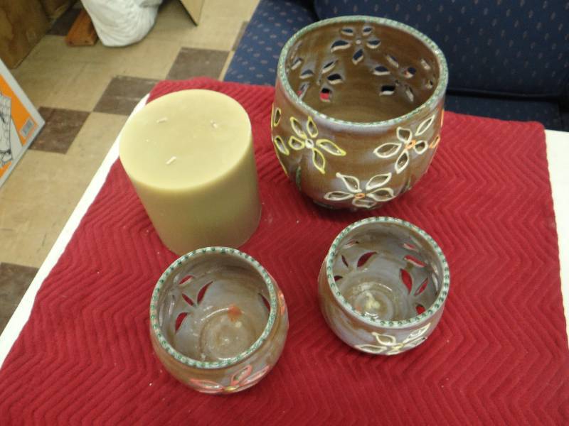 lot 1273 image: Set of 3 terracotta floral design candle lanterns & 1-3 wick candle.