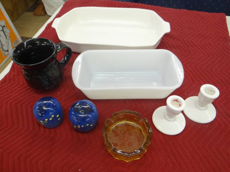 lot 1280 image: Pfaltzgraff baking dish, vintage glasbake bread pan, pair of glazed Terra cotta saltpepper shakers, pair of candle sticks, ashtray & mug.