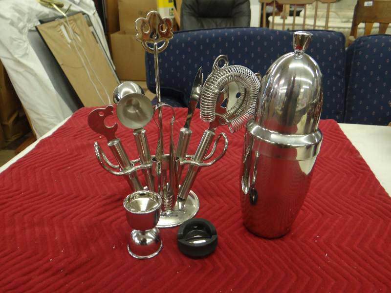 lot 1281 image: Stainless steel bar set wmixing tools & cocktail shaker.