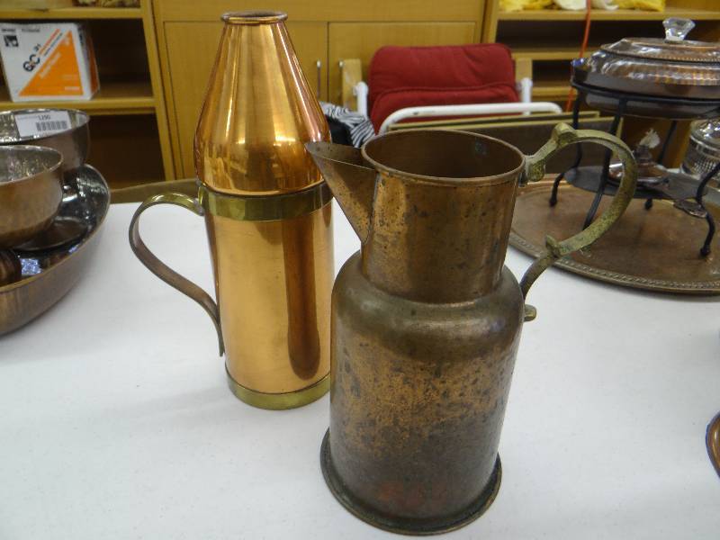 lot 1291 image: 2 Copper & brass pitchers.