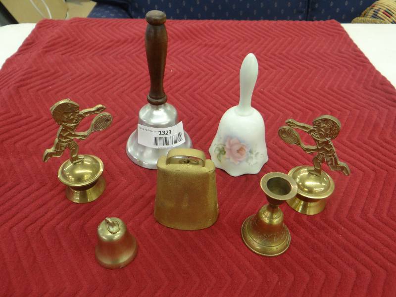 lot 1323 image: Lot of 7 bells - brass, ceramic, metal.