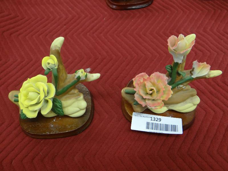 lot 1329 image: Set of 2 porcelain flowers on wood base.