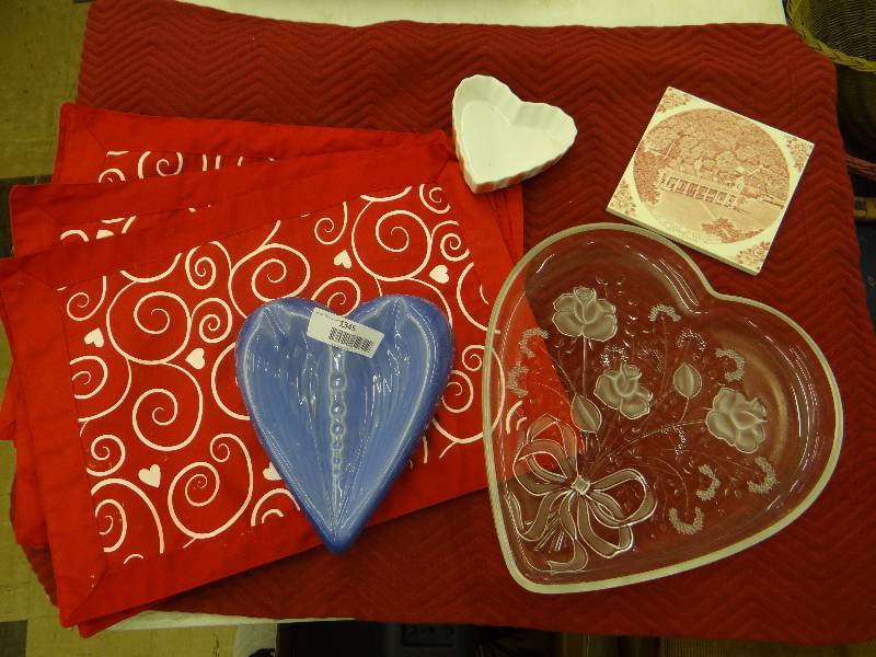lot 1345 image: 6 Valentines place mats, Washington trivit, heart dish, vintage blue heart ashtray, large heart tray wrose.