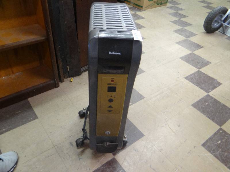 lot 1373 image: Holmes electric heater on casters.