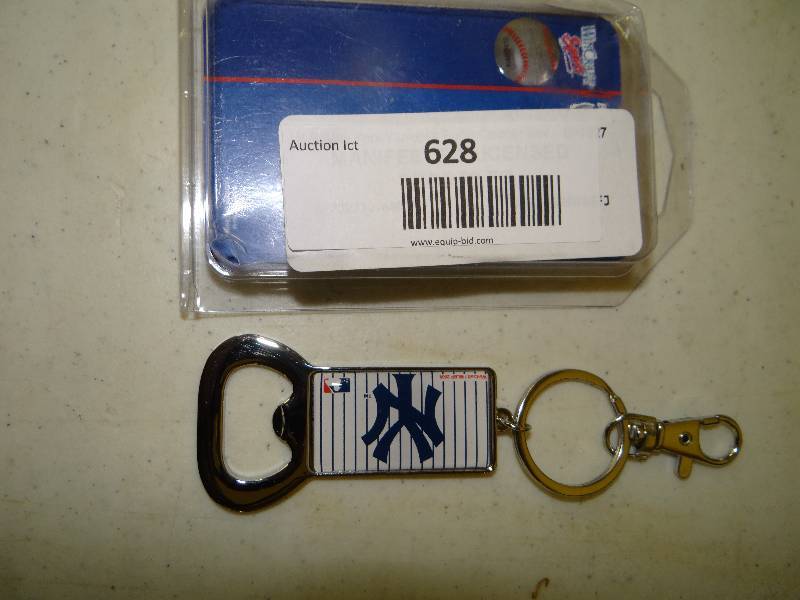 lot 628 image: NY key chainbottle opener.