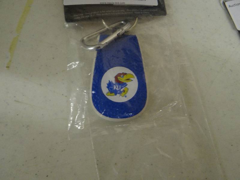 lot 639 image: KU key chain.