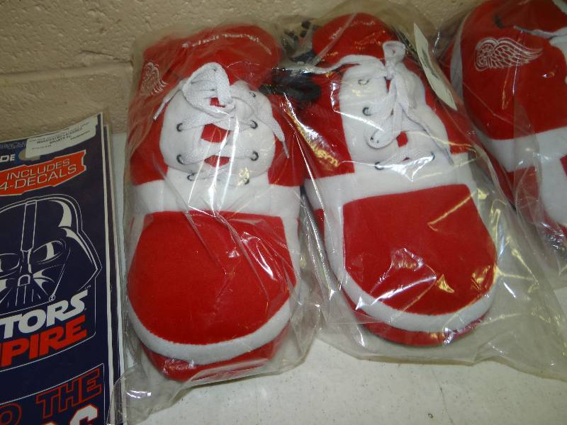 lot 653 image: Red wing slippers.