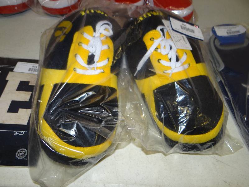 lot 655 image: Iowa slippers.